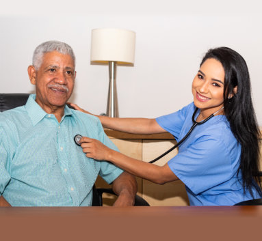 Home health care nurse assisting an elderly patient in his house