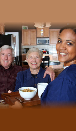 Home health care worker and an elderly couple