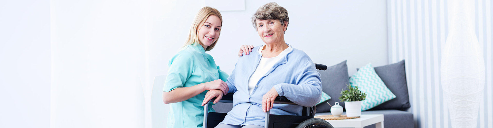 portrait of a caregiver and an elderly woman